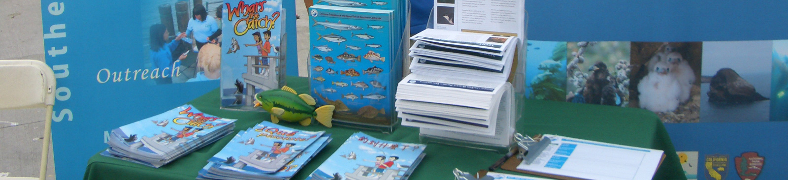 Table with fishing brochures