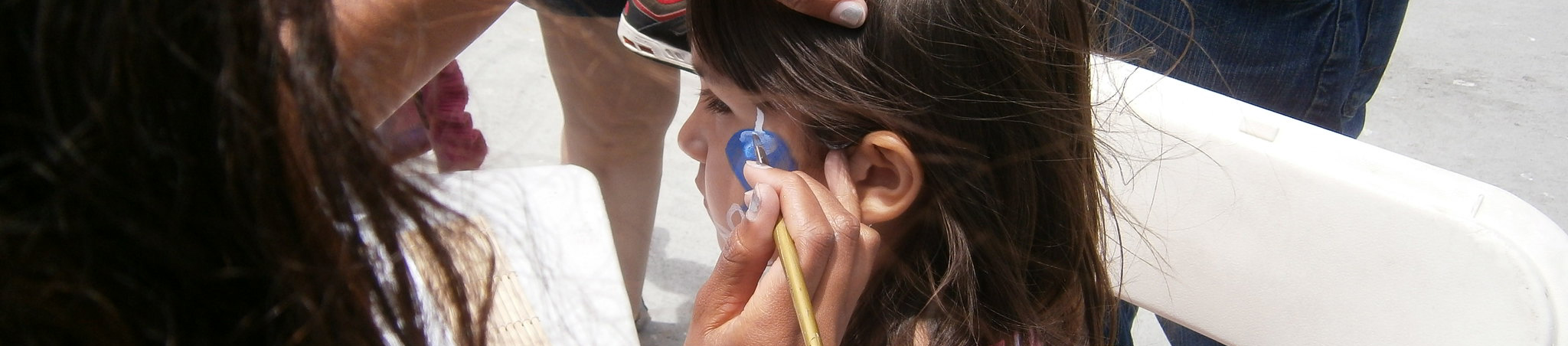 Child getting face painted